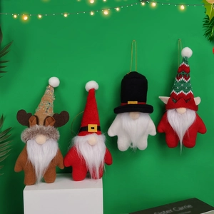 Lot de quatre gnomes de Noël festifs avec bonnets tricotés et décors à paillettes