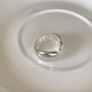 Minimalist 925 sterling silver drop ring with high polish finish and open band design