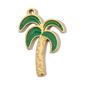 Detailed view of a gold-tone palm tree pendant with green enamel for DIY jewelry