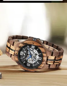 Detailed macro of automatic mechanical wooden watch with hollow dial and streamlined texture