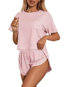 Detail of pink and white striped two-piece loungewear set with soft knitted texture