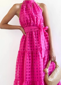 Detail view of fuchsia checkered halter dress with matching waist belt and bow tie