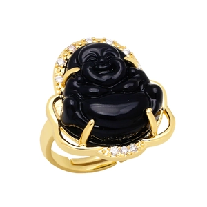 Close-up of Maitreya Buddha ring with black stone inlay and sparkling crystals