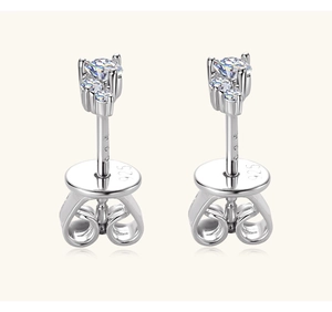 Detailed view of S925 sterling silver moissanite stud earrings with butterfly backings