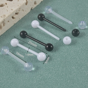 Detail view of acrylic tongue rings with 1.6mm gauge and 5mm ball size specifications