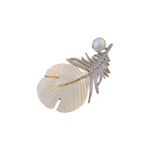 Luxurious gold plated feather brooch with white mother of pearl and shimmering zircons
