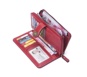 Interior view of red leather long wallet showing multi-card slots and cash compartments