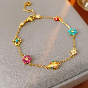 18K gold flower ladybug pendant bracelet with pink zircon and clover details