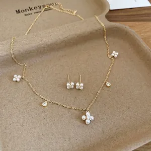 Elegant gold plated pearl flower jewelry set with adjustable necklace and stud earrings