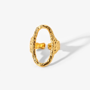 Detail of the hammered texture and hollow oval design on this gold open ring