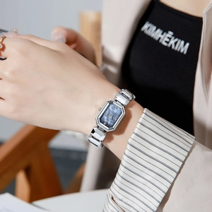 Elegant silver stainless steel quartz watch for women with an octagonal mother of pearl dial