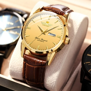 Gold quartz watch for men with brown leather strap and dual day-date calendar display
