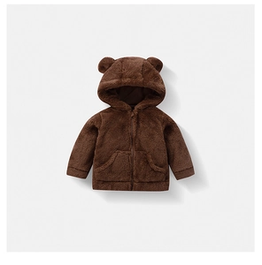 Detailed macro view of children's fleece hoodie with bear ears and soft plush texture