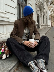 Dark style long resin cross pendant necklace paired with a vintage streetwear outfit