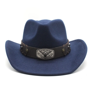 Detailed close-up of dark blue felt cowboy hat with leather band and metal bull head buckle