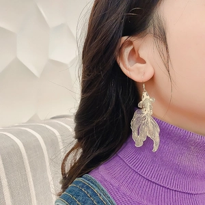 Elegant gold hollow koi fish hook earrings in Chinese style for a vintage ethnic look
