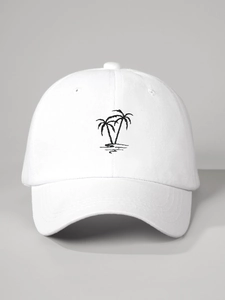 Detailed close-up of black coconut tree embroidery on white cotton baseball cap