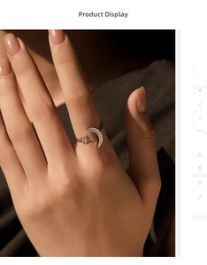Macro detail of S925 sterling silver star and moon ring with pavé sparkling zircons