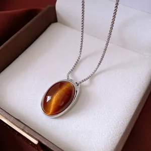 Vintage oval resin pendant necklace with tiger eye stone effect and silver chain