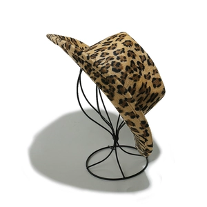 Classic leopard print wide-brim felt fedora hat displayed on a metal stand for styling