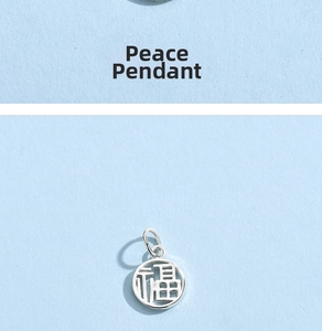 Close-up of 925 sterling silver Fu character pendant for DIY bracelet and necklace jewelry
