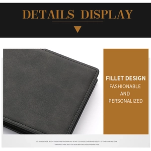 Detail of charcoal grey leather wallet showing smooth fillet design and precise stitching