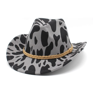 Thick cow print felt cowboy hat with rolled brim and decorative braided rope trim