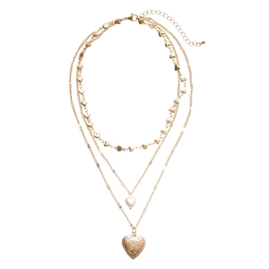 Three-layer gold necklace with faux pearls and vintage heart pendants for women