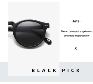 Detail view of black vintage round sunglasses featuring silver double dot metal rivets