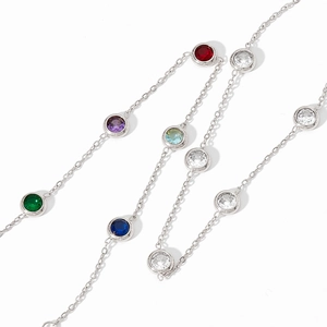 Polished stainless steel bracelet with vibrant multi-colored round zircon gemstones