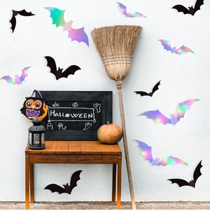 Halloween black and holographic bat wall stickers with festive pumpkin decor on porch