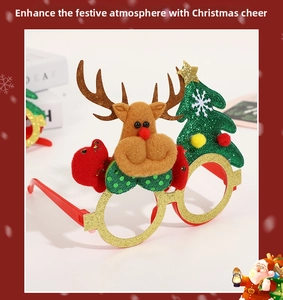 Detail showing reindeer and glittery Christmas tree decorations on festive glasses