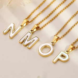 Golden stainless steel letter necklaces with shimmering white mother of pearl inlay