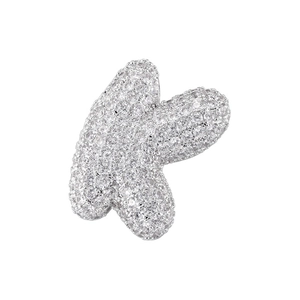 Close-up of silver-tone letter K pendant featuring full-set cubic zirconia pave stones