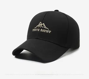 Detail view of mountain embroidery and Youth Dayoff text on black baseball cap