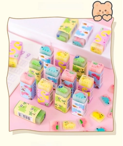 Detail of colorful dinosaur erasers with cute cartoon sleeves on a pink background