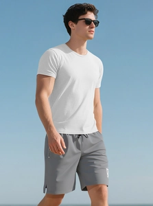 Outdoor shot of men's white crew neck t-shirt and grey fitness shorts for summer