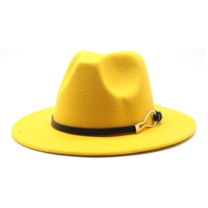 Detail of yellow wool fedora hat with black leather band and gold metal buckle