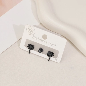 Ensemble de boucles d'oreilles en acier noir mat avec pissenlit et clous ronds