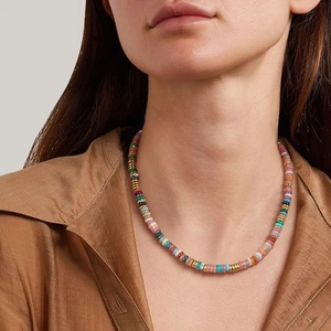 Bohemian colorful natural stone beaded necklace with gold spacers on female model