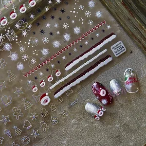 5D embossed Christmas nail stickers with Santa, gingerbread man and snowflake patterns