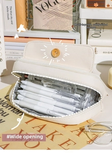 Close-up of large capacity canvas pencil case with button flap and spacious compartments