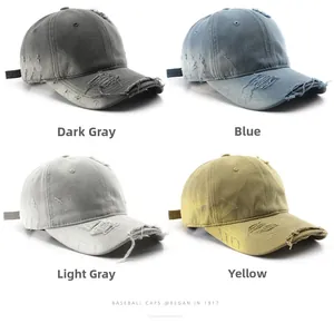 Distressed baseball caps in four colors featuring vintage washed fabric and ripped details