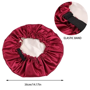 Detail of burgundy satin sleep cap showing the 36cm diameter and adjustable elastic band