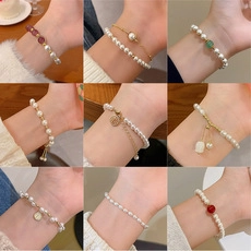 Collage of pearl bracelets in minimalist and vintage styles with gold pendants