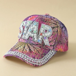 Floral baseball cap with rhinestone STAR lettering and pearl trim on the brim