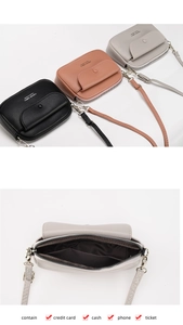 Detail view of leather crossbody phone bag showing inner storage for cards and cash