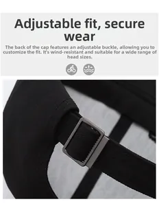 Detail of adjustable metal buckle and strap on the back of the black baseball cap