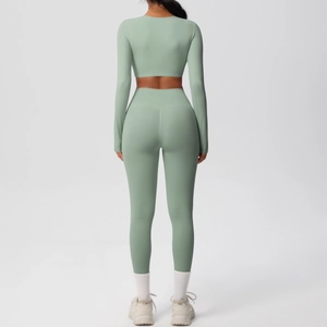 Rear view of Sage Green two-piece yoga set showing slim fit long sleeve top and leggings
