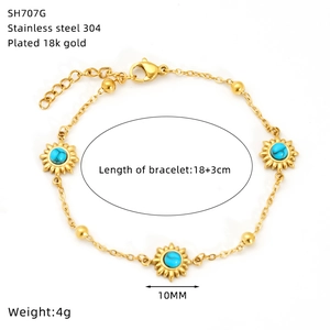 Detail of 18K gold plated sunflower bracelet with blue turquoise inlay and size specs